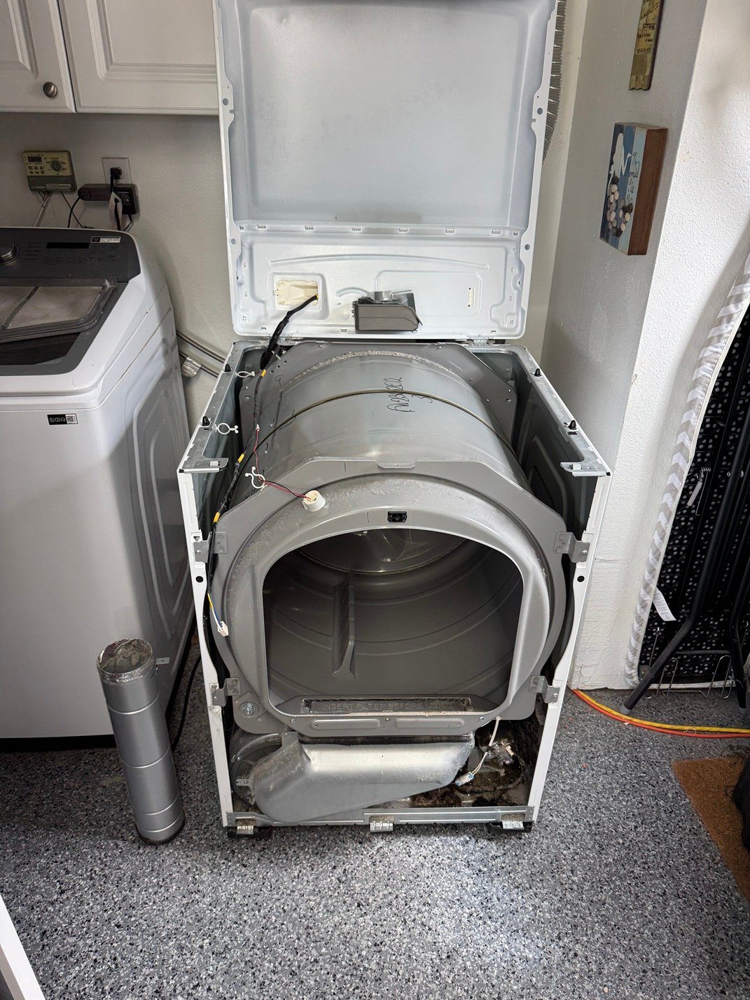 Dryer Repair: Belt and Drum Roller Replaced, Plus Internal Cleaning
